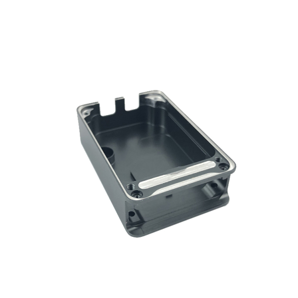 Machined block with side faces and a hole pattern cut on a fourth axis